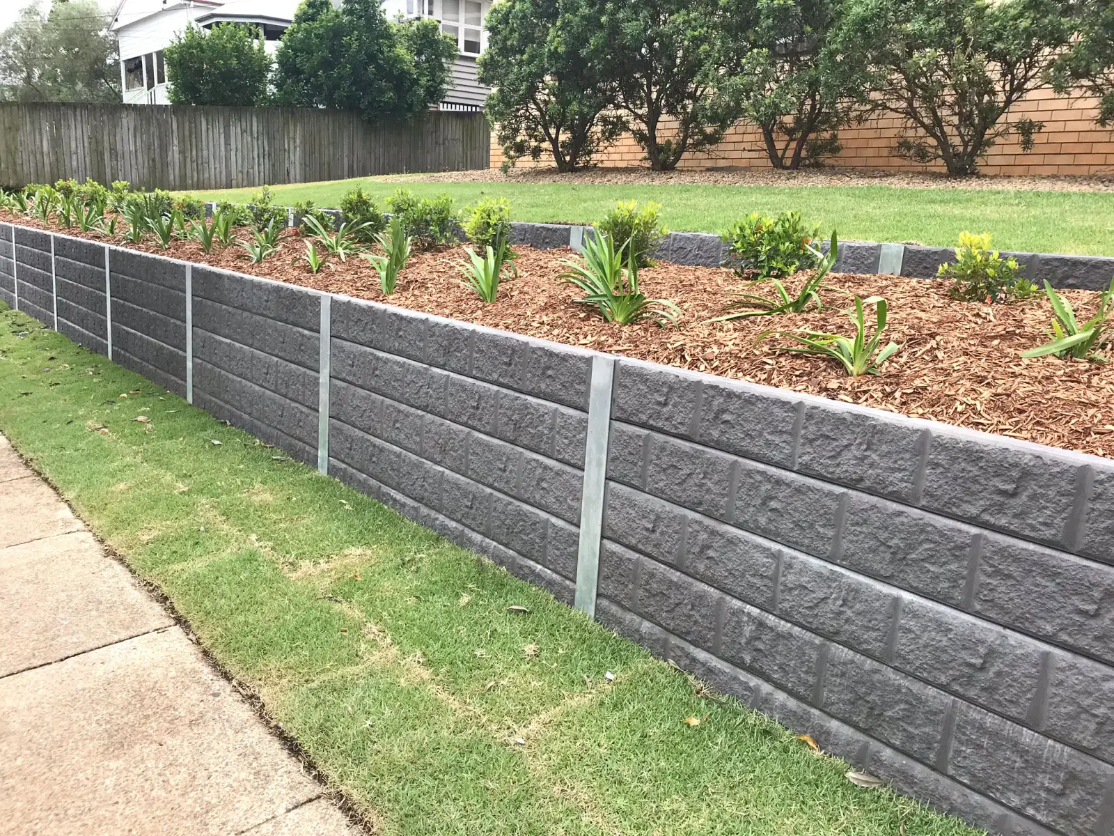 Concrete retaining wall on a Northern Beaches property