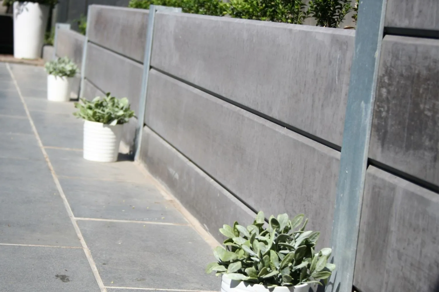 Concrete sleeper retaining wall on a terraced yard