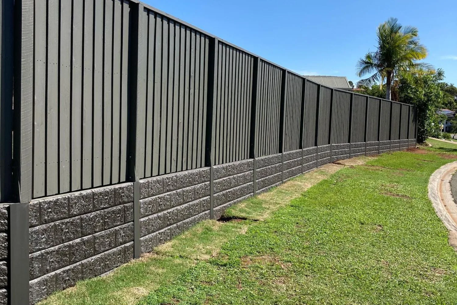 Concrete sleeper retaining wall finished in a natural tone